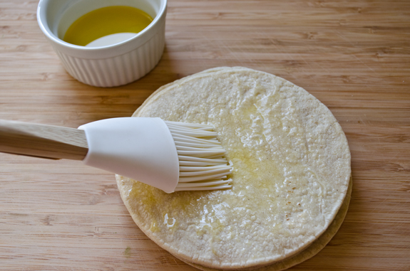 brushing-tortillas-with-oil