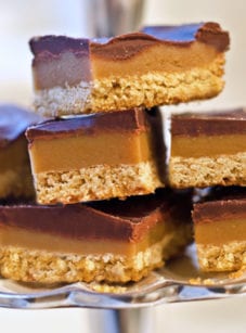 Stack of chocolate caramel shortbread squares (Millionaire's shortbread).