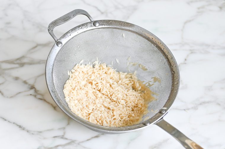 rinsed basmati rice in strainer