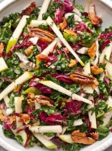 Plate of kale, apple, and pancetta salad.