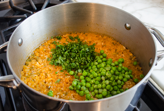 adding-cilantro-and-peas