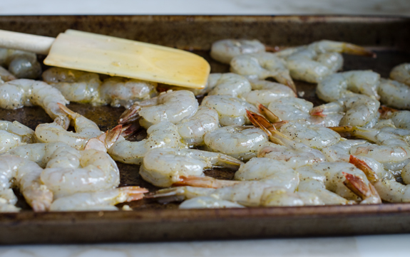 tossing-shrimp-with-olive-oil-and-garlic