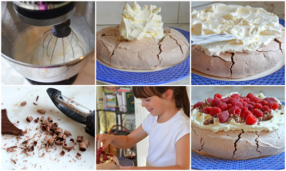 finishing-pavlova-with-whipped-topping-chocolate-and-raspberries
