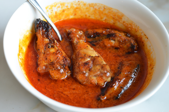 dipping-wings-in-sauce