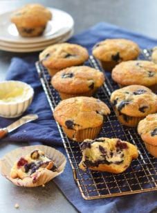 Blueberry muffins in a wire rack.