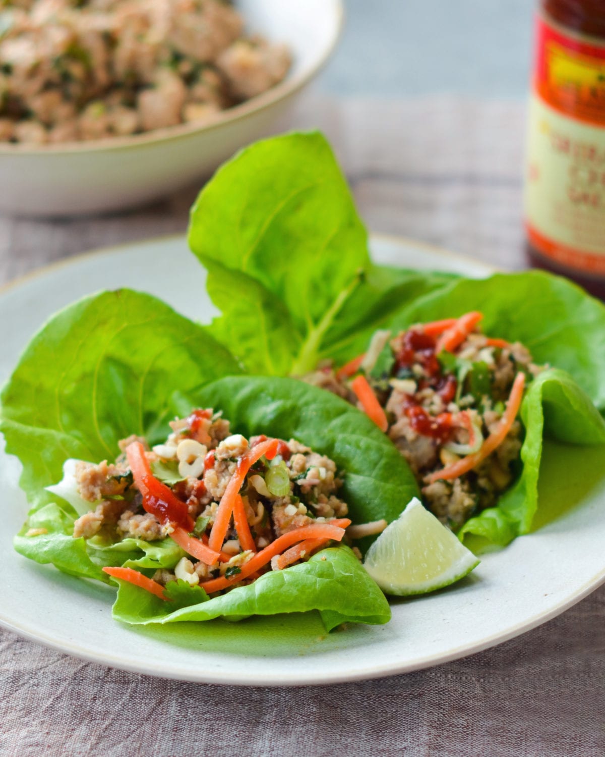 Plate of Thai-style minced chicken lettuce cups.