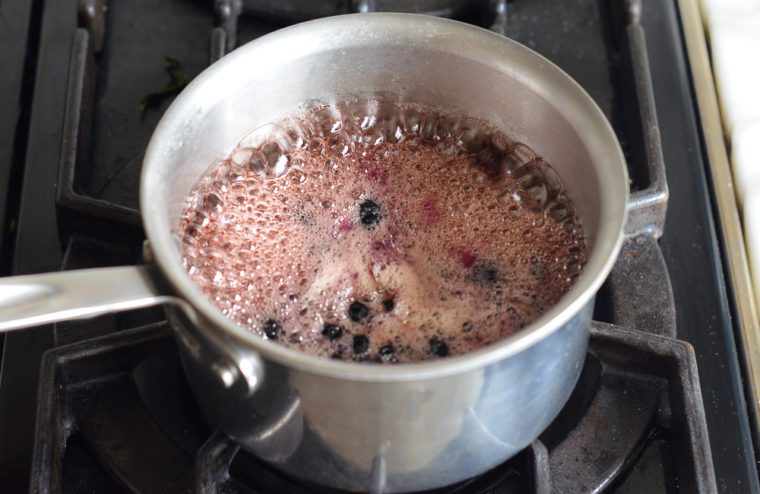 boiling blueberries and maple syrup