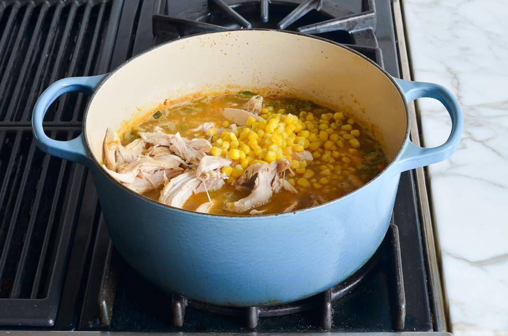 adding the chicken, beans, corn and lime 