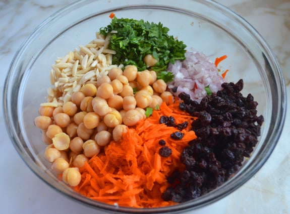 Unmixed salad ingredients in a bowl.