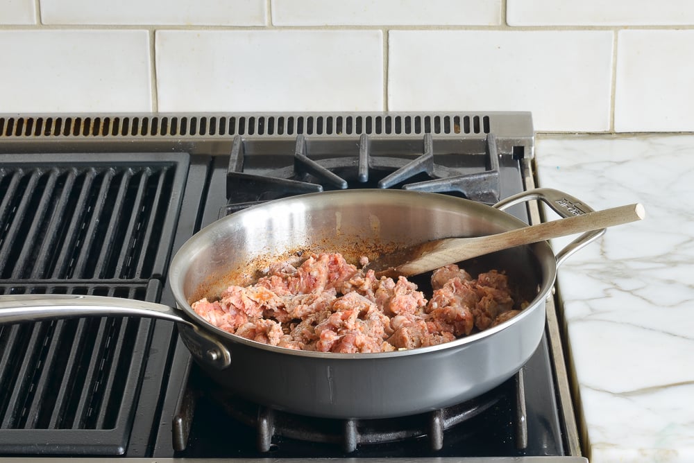 Sausage in a skillet.