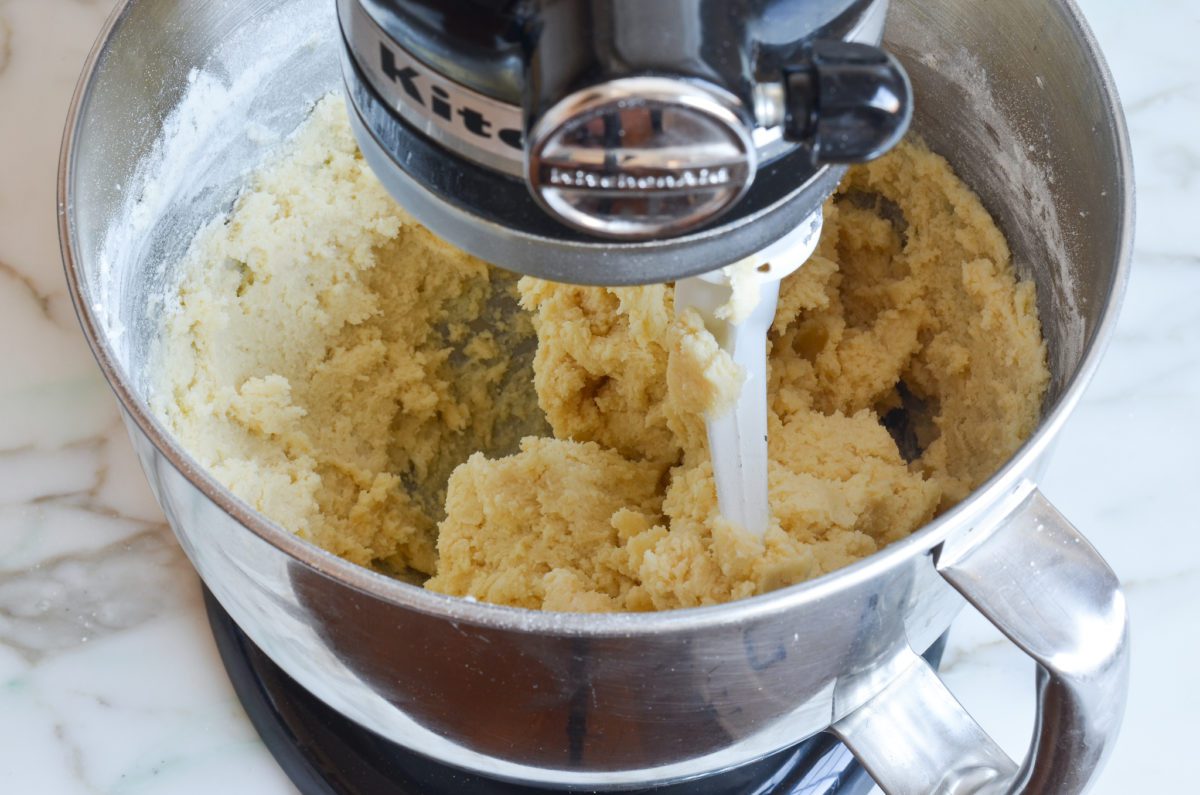 Stand mixer full of snickerdoodles dough.