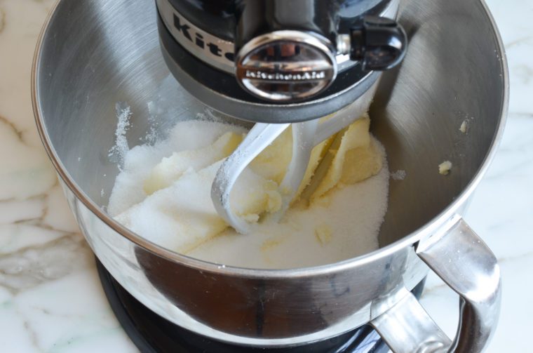 butter and sugar in bowl of electric mixer
