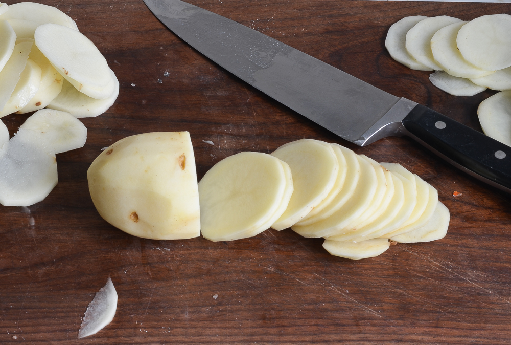 slicing the potatoes