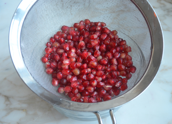 Sieve of pomegranate arils.