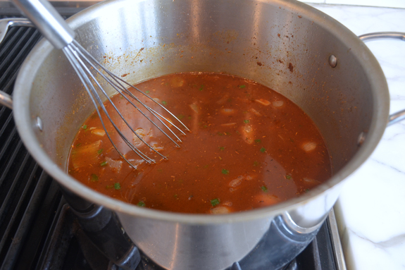 whisking-broth-and-spices