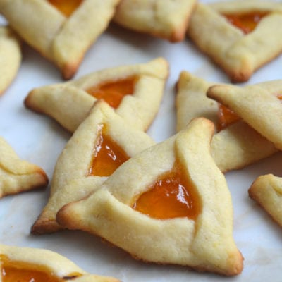 Hamantaschen on a countertop.