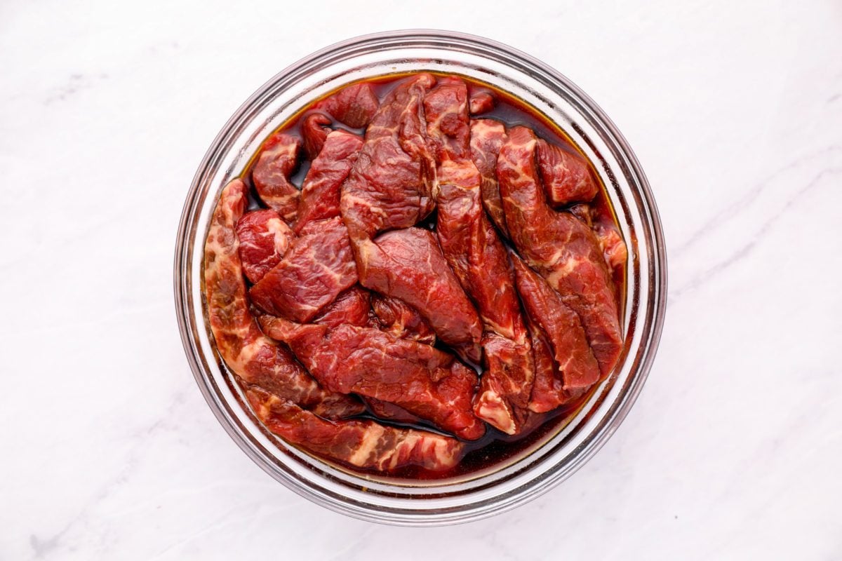 beef marinating in bowl