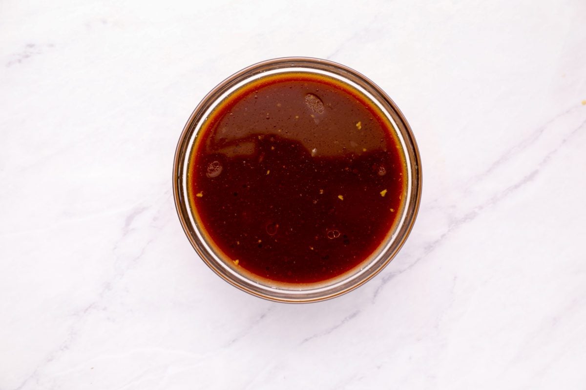 remaining soy sauce, cornstarch, remaining 3 tablespoons of Shaoxing wine (or dry sherry), oyster sauce, chicken broth, sugar, and sesame oil in bowl
