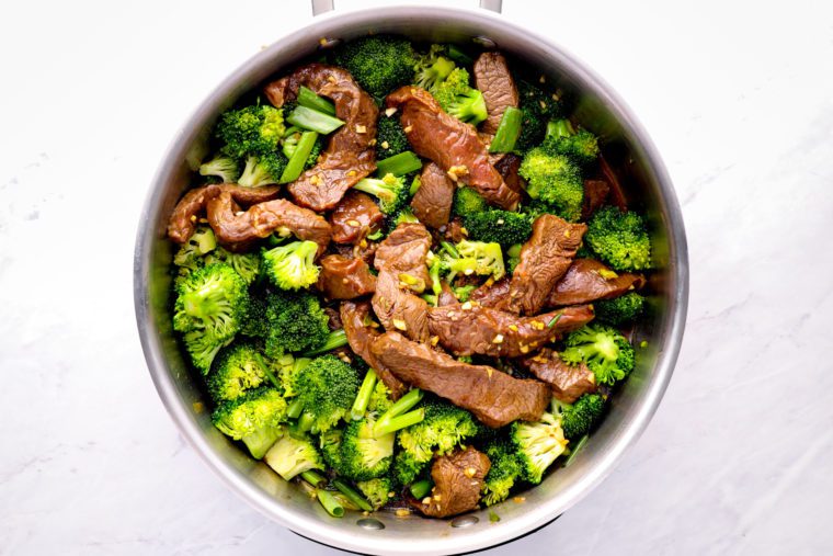 beef, broccoli and sauce in pan