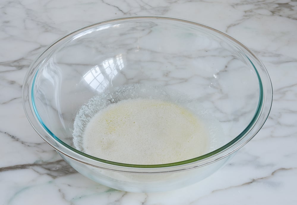 Glass bowl of melted butter.