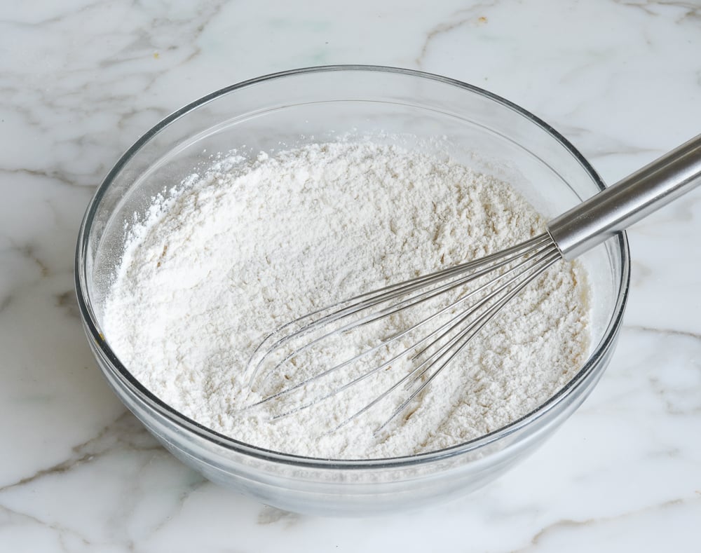 whisking dry ingredients for vanilla cupcakes