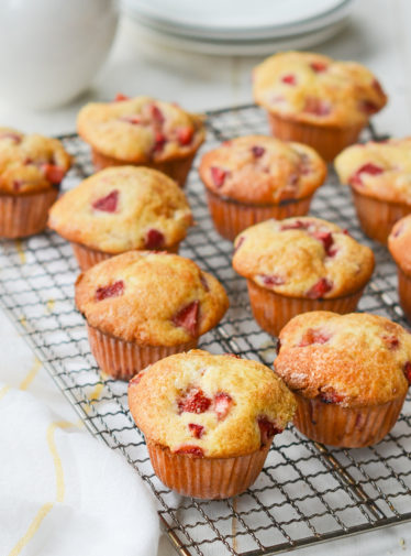 Strawberry Muffins on a wire rack.
