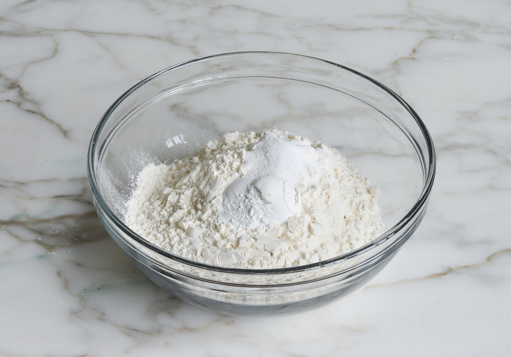 combining dry ingredients in mixing bowl