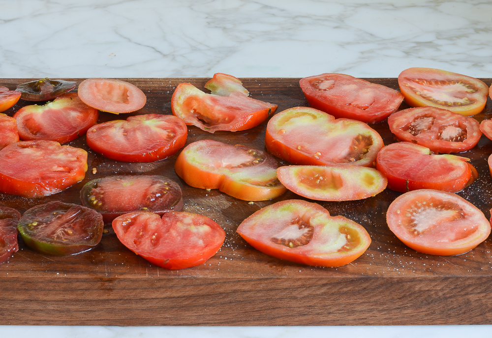 seasoning the tomatoes