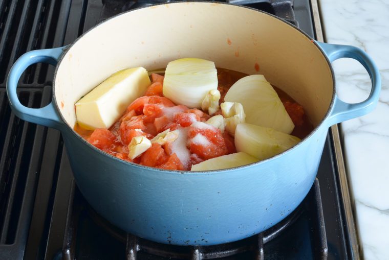 tomato sauce ingredients in Dutch oven