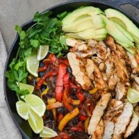 Skillet of chicken fajita fixings.