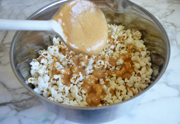 adding-caramel-to-popcorn