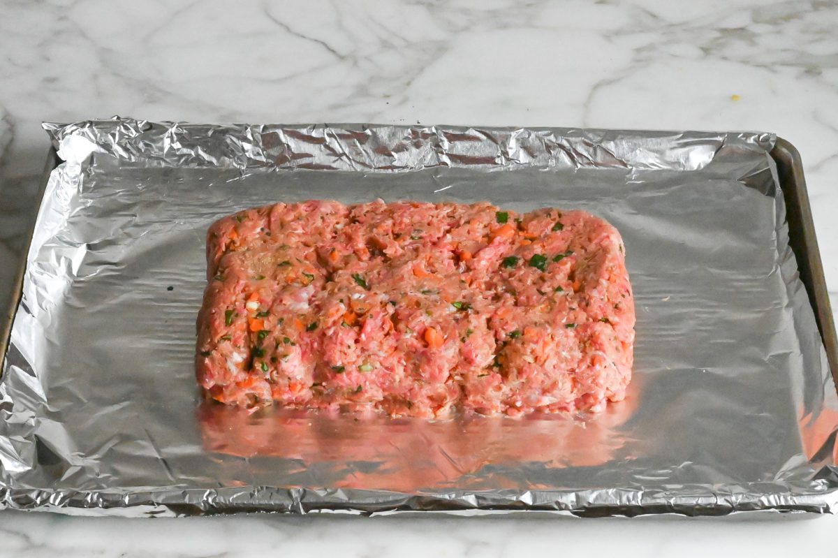 free-form italian meatloaf on baking sheet