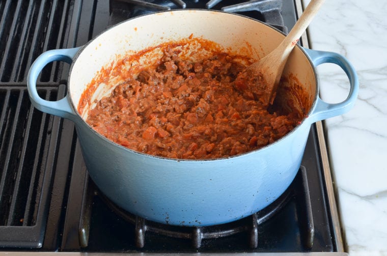 Dutch oven of lasagna sauce.