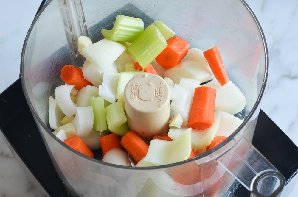 vegetables in bowl of food processor