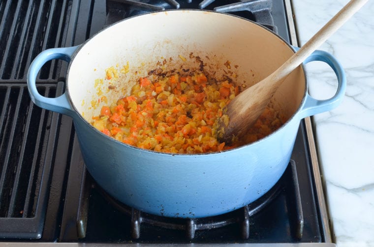 Cooked vegetables in a Dutch oven.