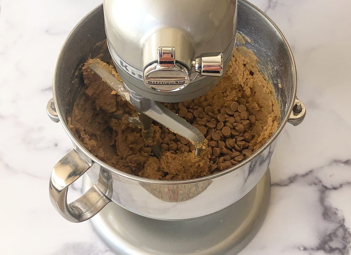 adding the peanut butter chips and peanuts