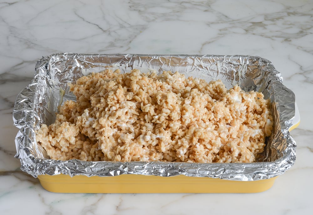 rice krispie treat mixture in baking pan.