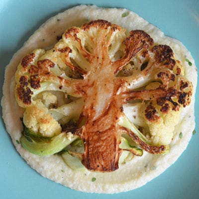Cauliflower steak on cauliflower puree.