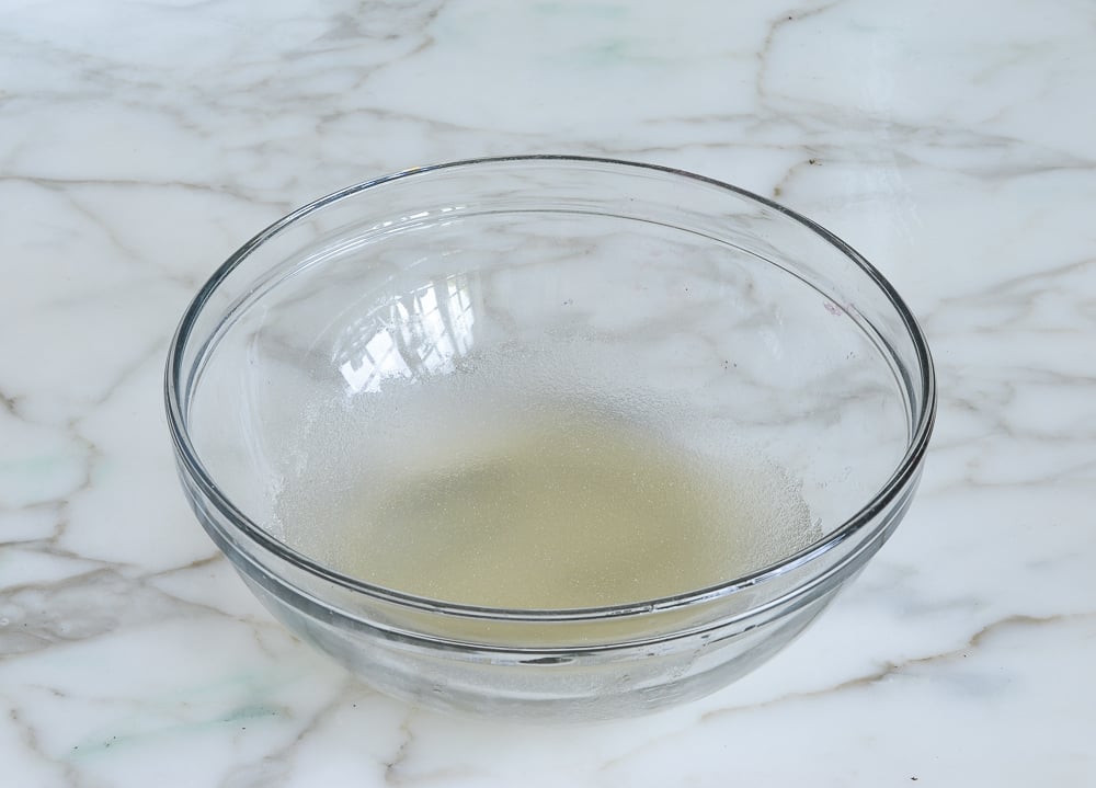 Bowl of grape juice and gelatin.