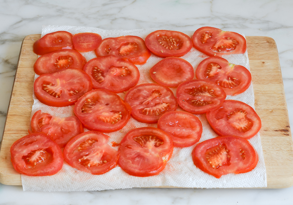 draining tomatoes
