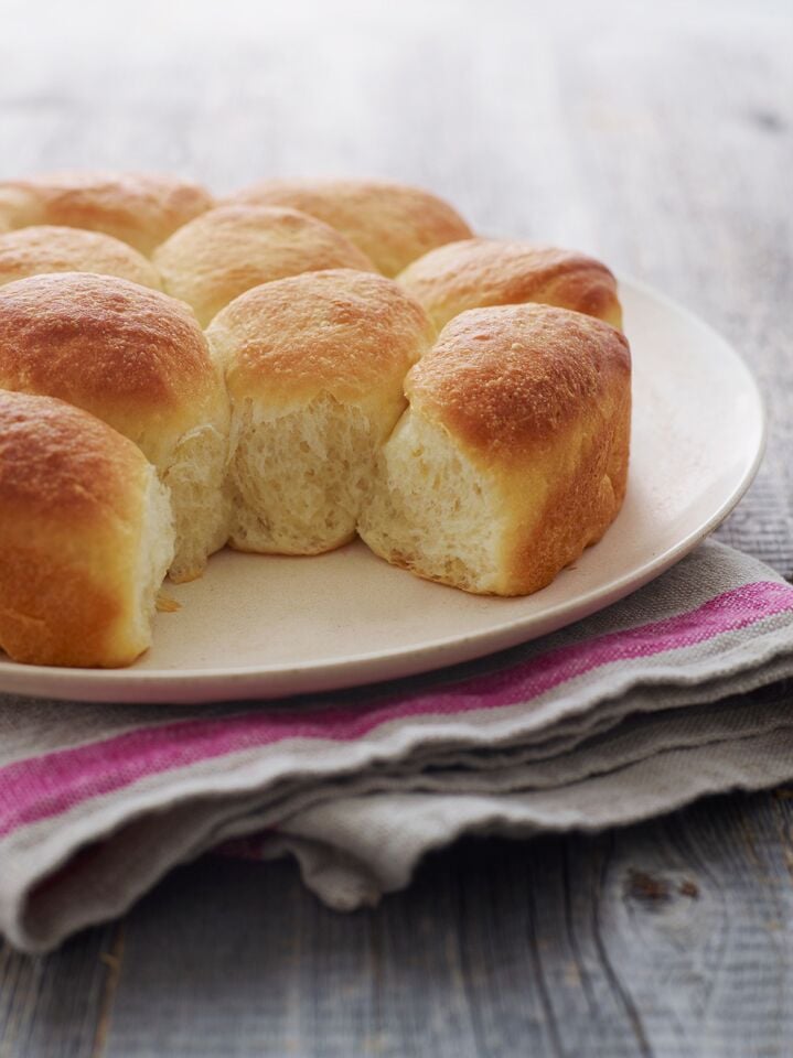 Plate of dinner rolls.