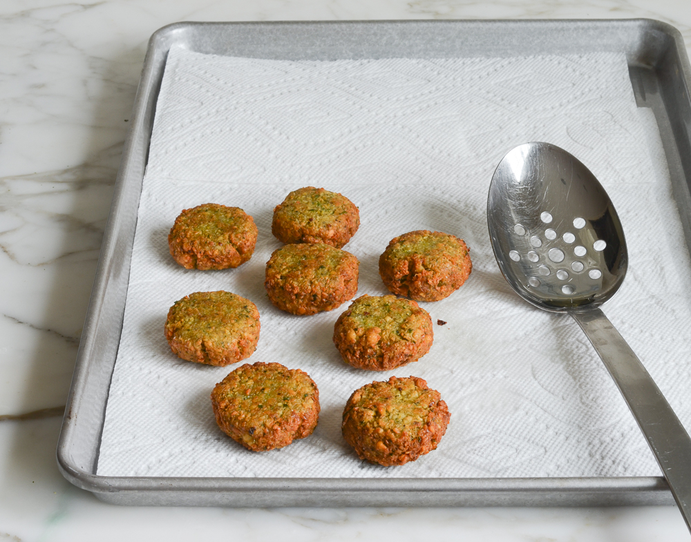 falafel on platter with tahini sauce