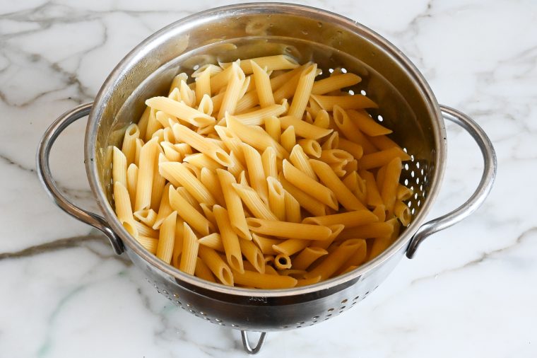 drained penne in colander