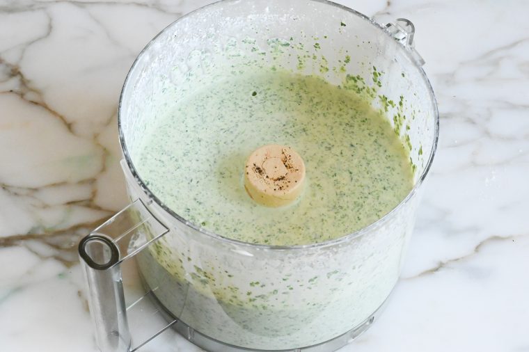 pureed spinach cream sauce in food processor
