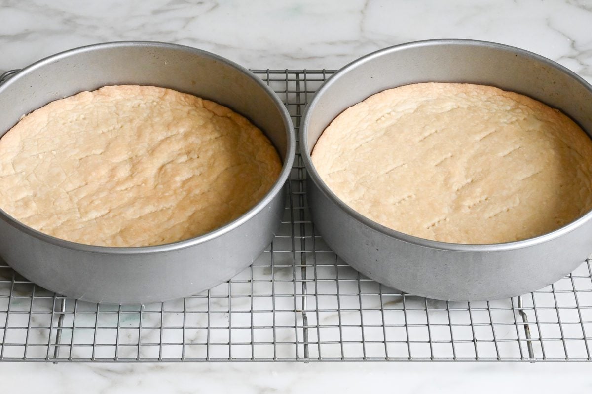shortbread rounds cooling on rack in pans