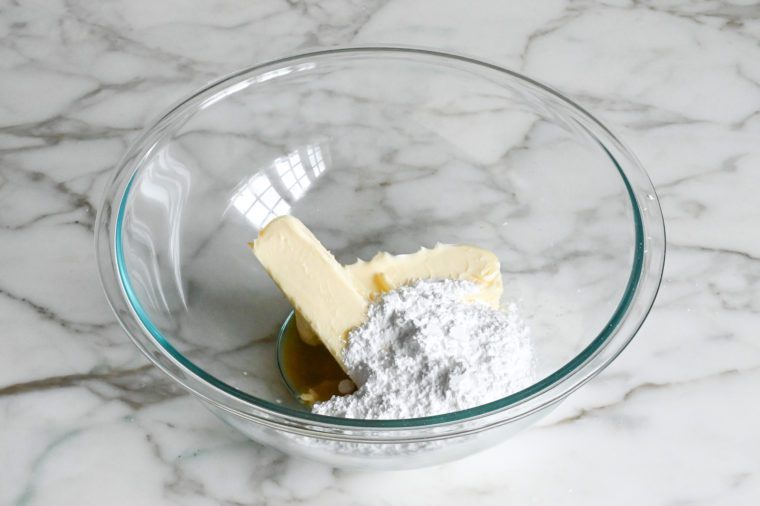 butter, sugar, salt, vanilla, and almond extract in mixing bowl