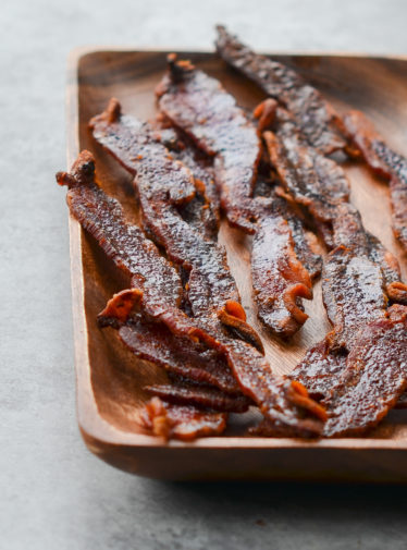 candied bacon on a platter