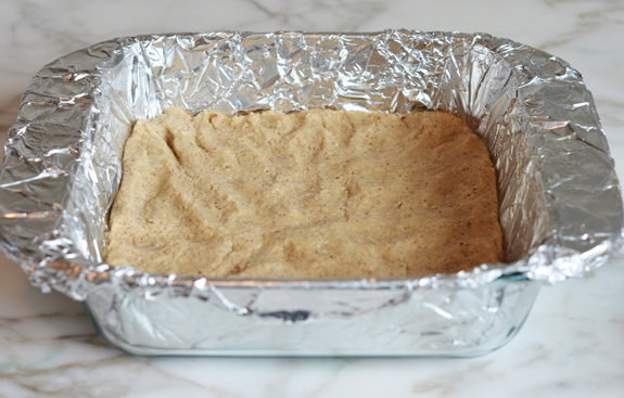 Dough in a foil-lined baking dish.