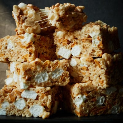 Stack of golden rice Krispie treats.