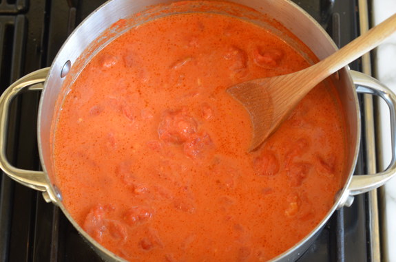 Pan of tomato and creme fraiche mixture.